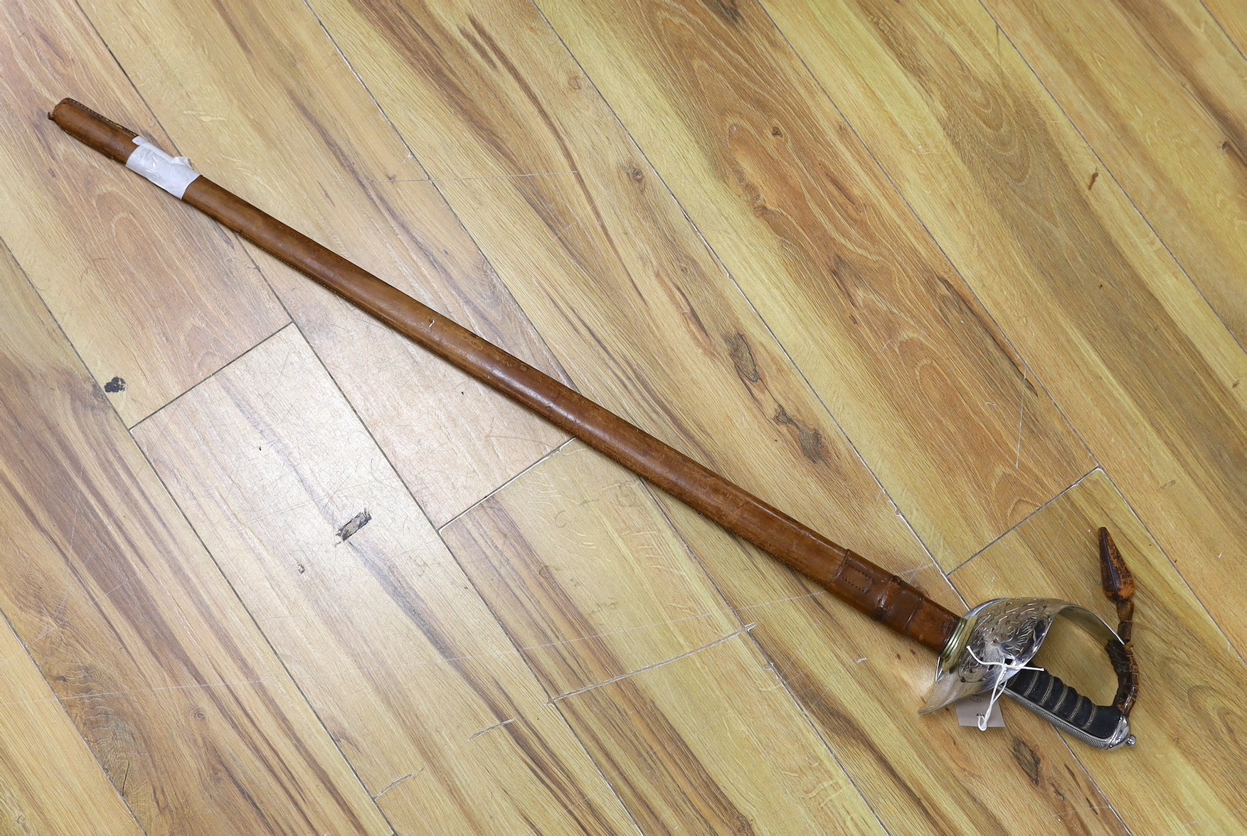A Wilkinson George V officer's dress sword, stamped 1930 with broad arrow